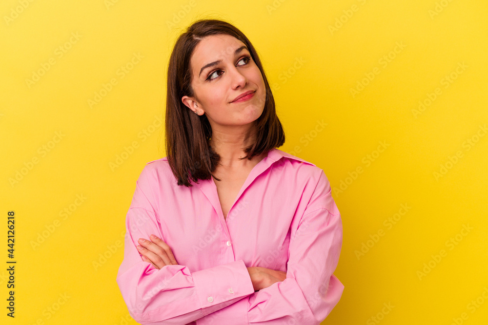 Young caucasian woman isolated on yellow background dreaming of achieving goals and purposes Young caucasian woman isolated on yellow background dreaming of achieving goals and purposes