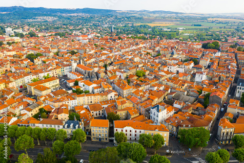 Scenic drone view of Riom summer cityscape and surroundings, Puy-de-Dome department, France photo