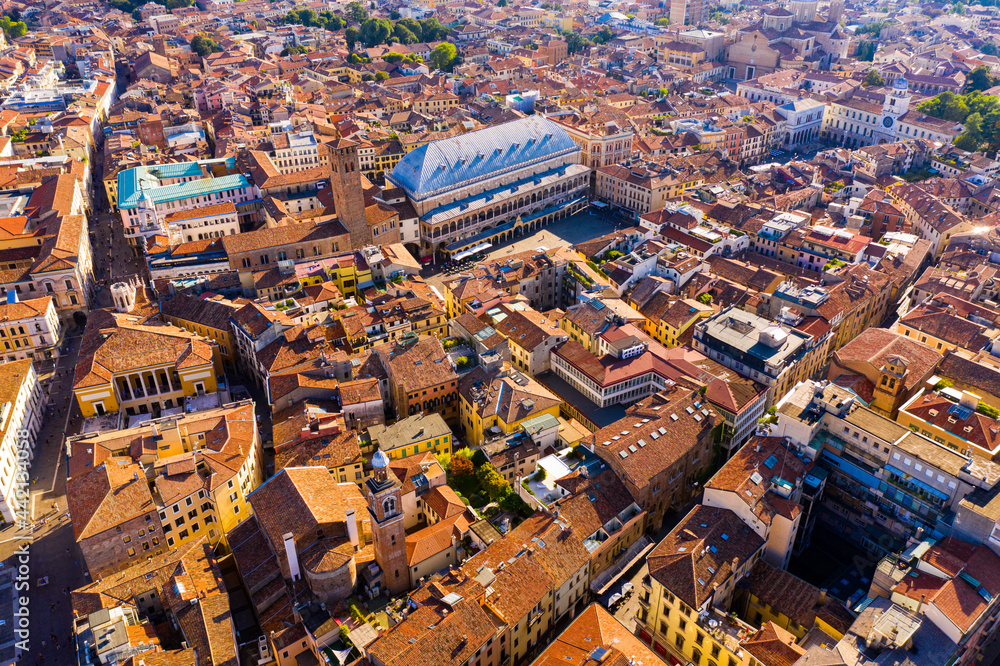 View from drone of Italian city of Padua overlooking large roof of Palazzo della Ragione, Veneto