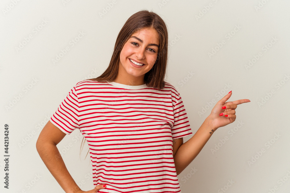 Young caucasian woman isolated on white background excited pointing with forefingers away. Young caucasian woman isolated on white background excited pointing with forefingers away.