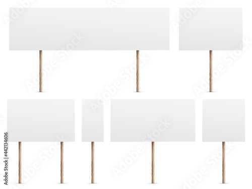 Protest banners. Realistic white placards for demonstrations. 3D blank boards on wooden sticks set. Politic strike posters templates. Social picket equipment. Vector empty billboards