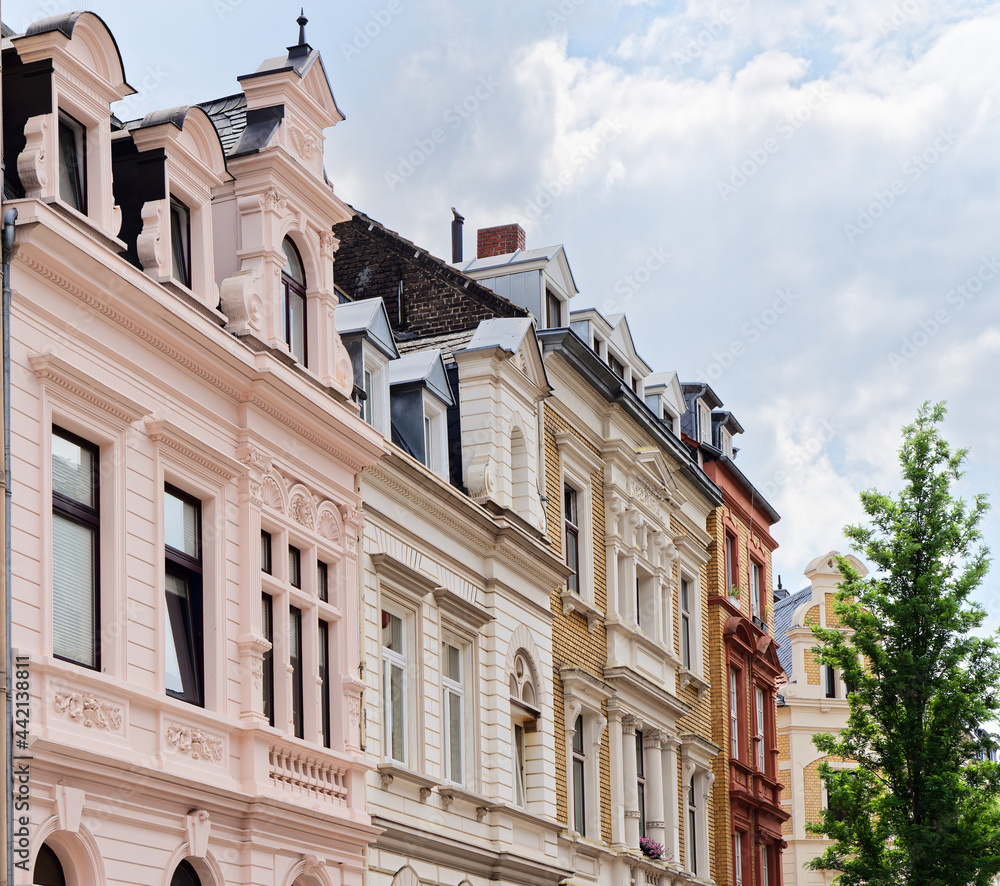 buildings in cologne from the late nineteenth century restored with pastel colours