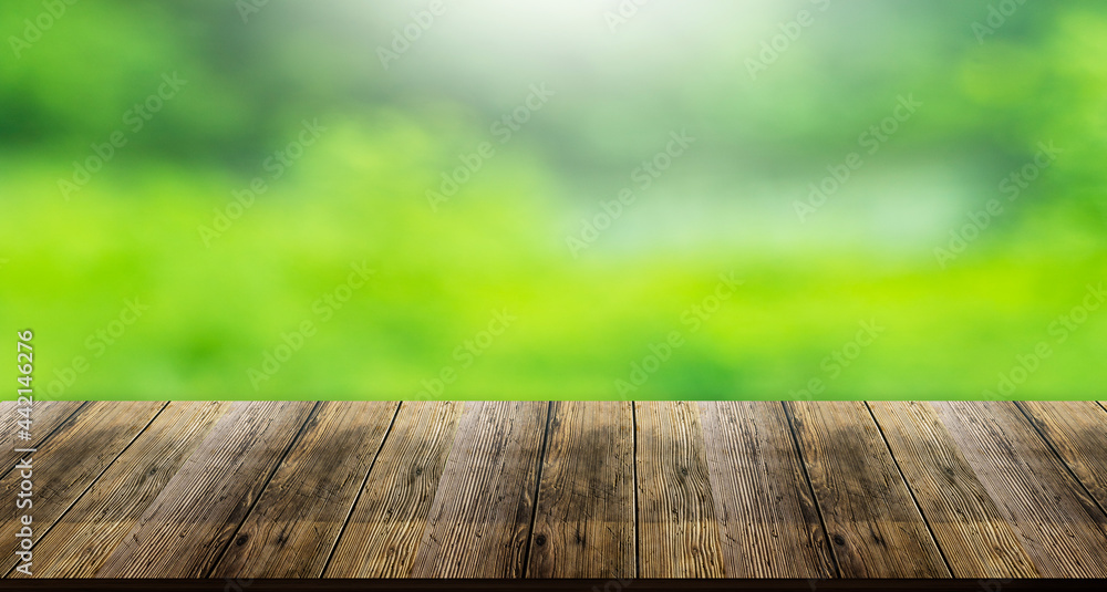 wooden table surface natural green background wooden table surface natural green background