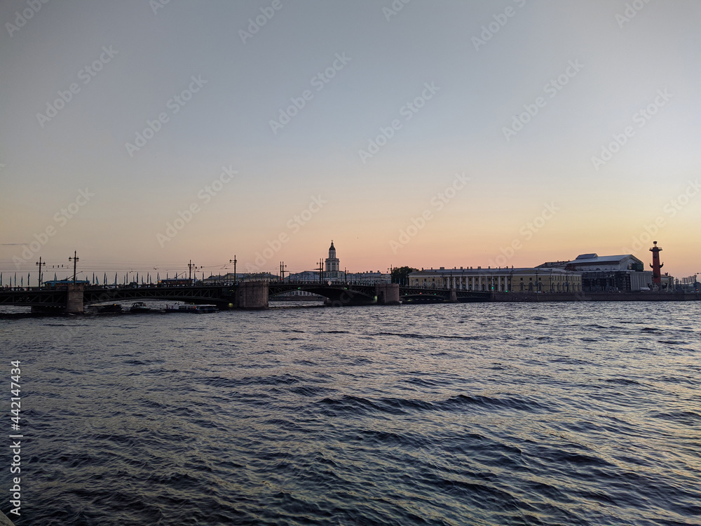 St. petersburg and the neva river in the evening in summer near the bridge.