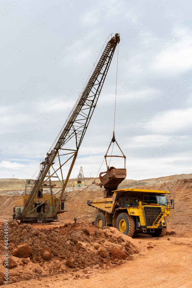 large excavator loads rock with iron or bauxite mining large excavator loads rock with iron or bauxite mining