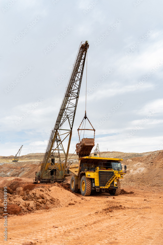 large excavator loads rock with iron or bauxite mining large excavator loads rock with iron or bauxite mining
