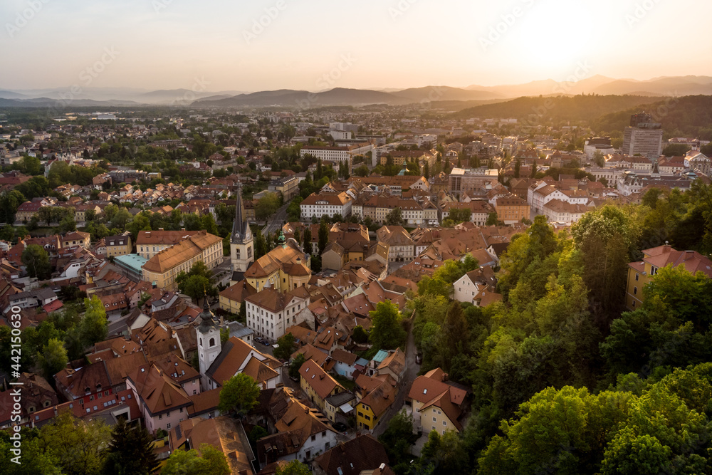 Aerial panorama of the Slovenian capital Ljubljana at sunset.