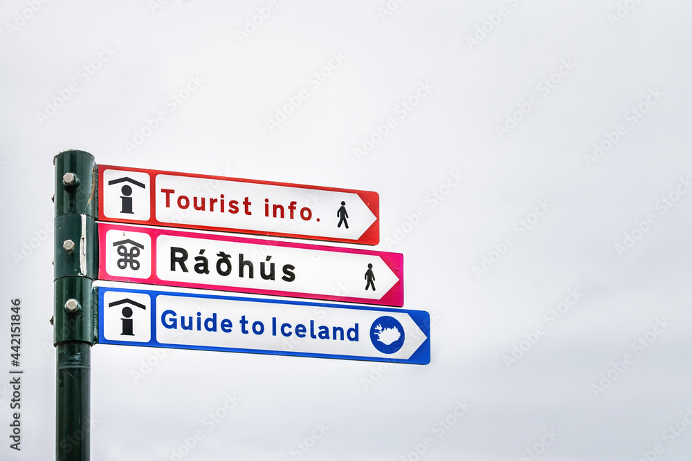 Reykjavik, Iceland street road in downtown center and sign for directions to landmarks tourist information and guide