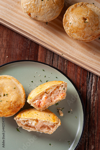 Typical Brazilian cuisine appetizer called Empada de Camarão. Top view photo