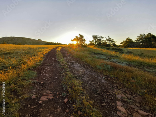 Sun rays. sunrise on the mountain. Light, hope, new day