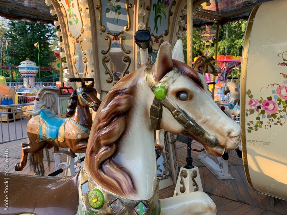 Retro children carousel in the park, empty carousel 