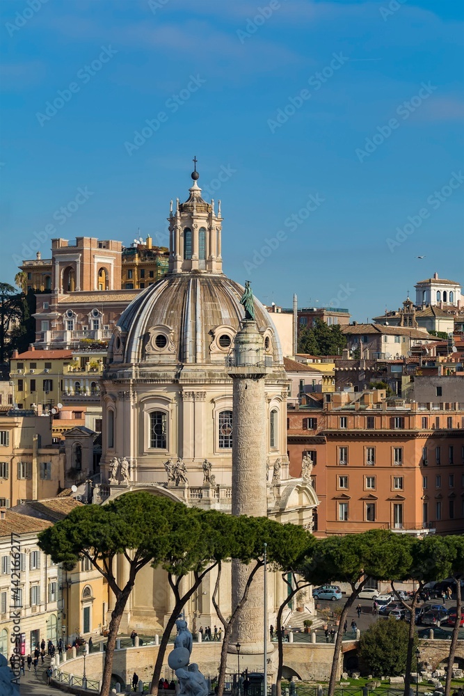The Church of the Most Holy Name of Mary at the Trajan Forum (Santissimo Nome di Maria al Foro Traiano) and Trajan's Column in Rome, Italy