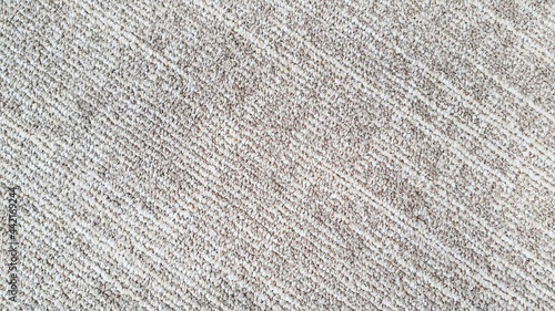 Fotografie close up of monochrome of white and beige carpet texture background for interior flooring material