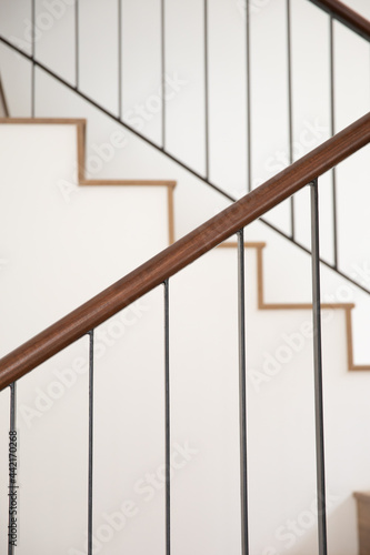 a wooden handrail in modern house