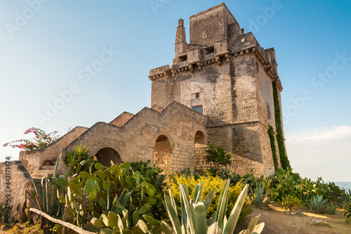 View of the historical fortification tower - Torre Colimena in village Manduria, province of Taranto, Puglia, Italy
