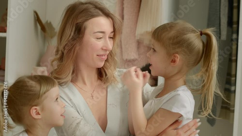 mom communicates with daughters twins