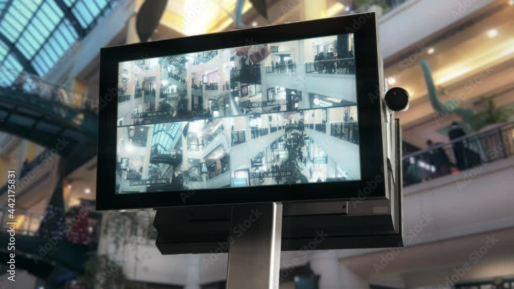 CCTV Surveillance Cameras Monitoring People Inside Shopping Mall. Split