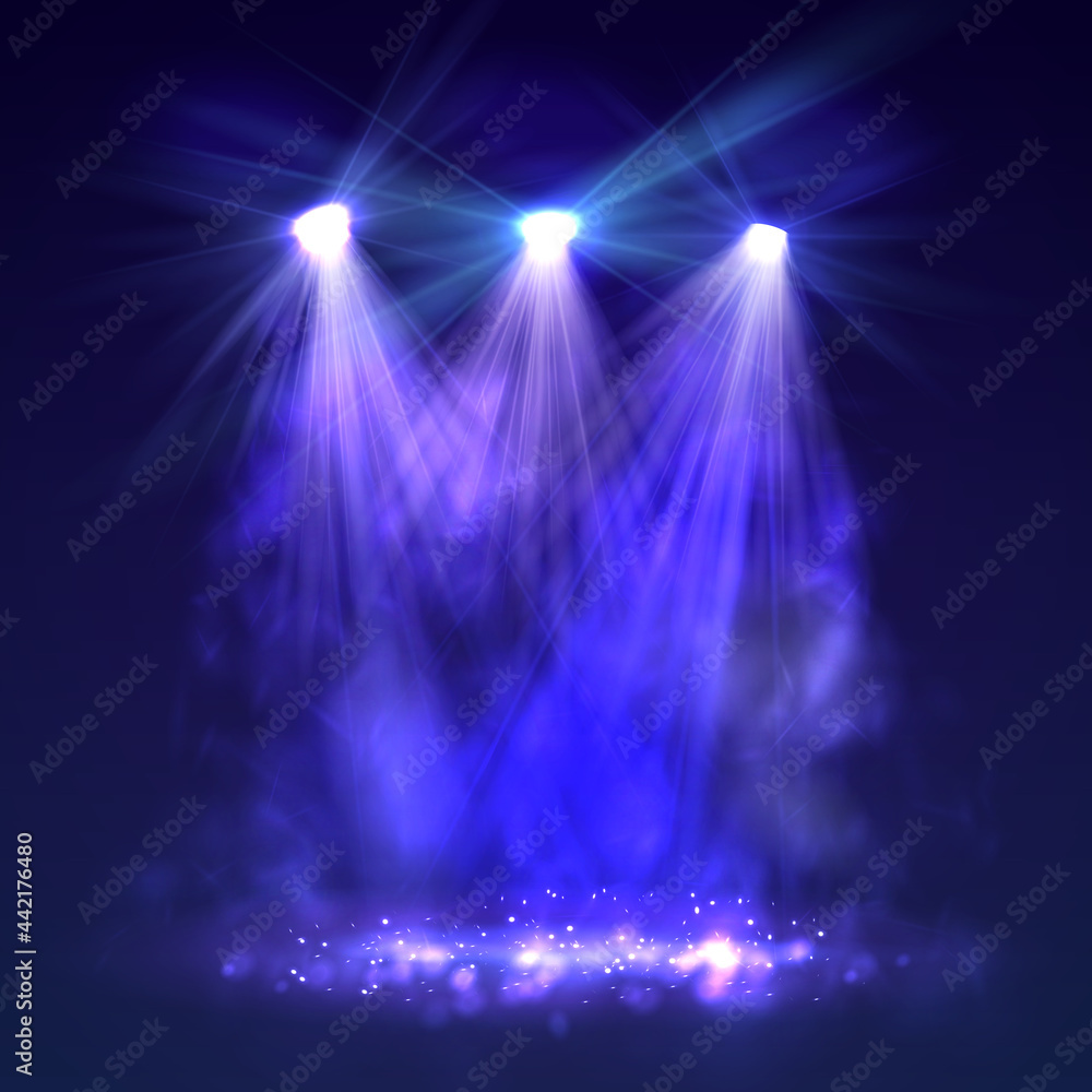 Spotlight on stage with smoke and light.