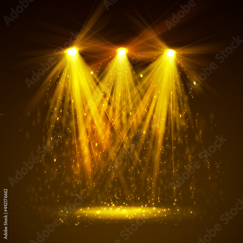 Spotlight on stage with smoke and light.