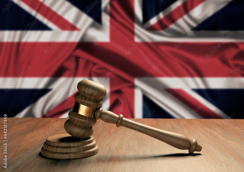 Wooden judge's gavel Symbol of law and justice with the flag of England. English Supreme Court