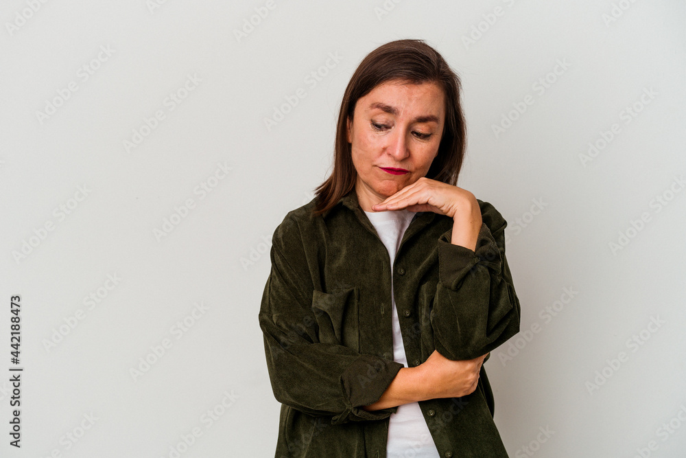 Middle age caucasian woman isolated on white background looking sideways with doubtful and skeptical expression. Middle age caucasian woman isolated on white background looking sideways with doubtful and skeptical expression.