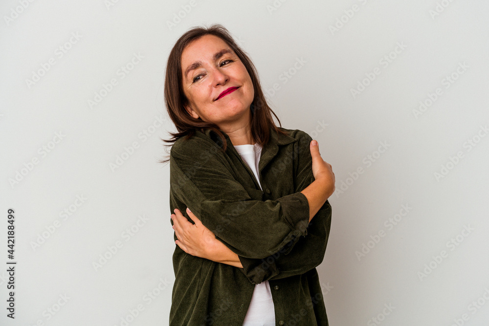 Middle age caucasian woman isolated on white background hugs, smiling carefree and happy. Middle age caucasian woman isolated on white background hugs, smiling carefree and happy.