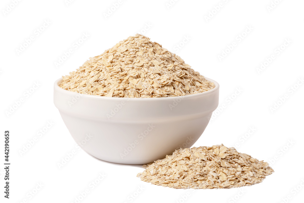A bowl of dry oatmeal. Healthy, simple breakfast food. A bowl of dry oatmeal. Healthy, simple breakfast food.