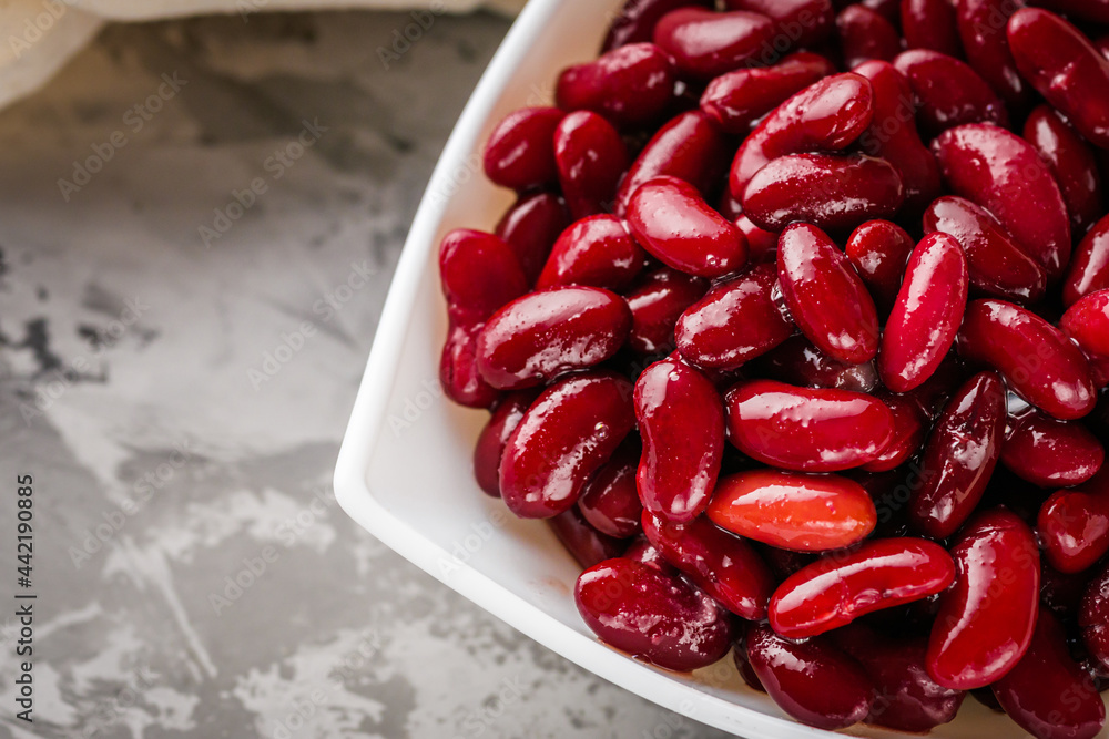 canned red kidney beans on a dark stone rustic background canned red kidney beans on a dark stone rustic background