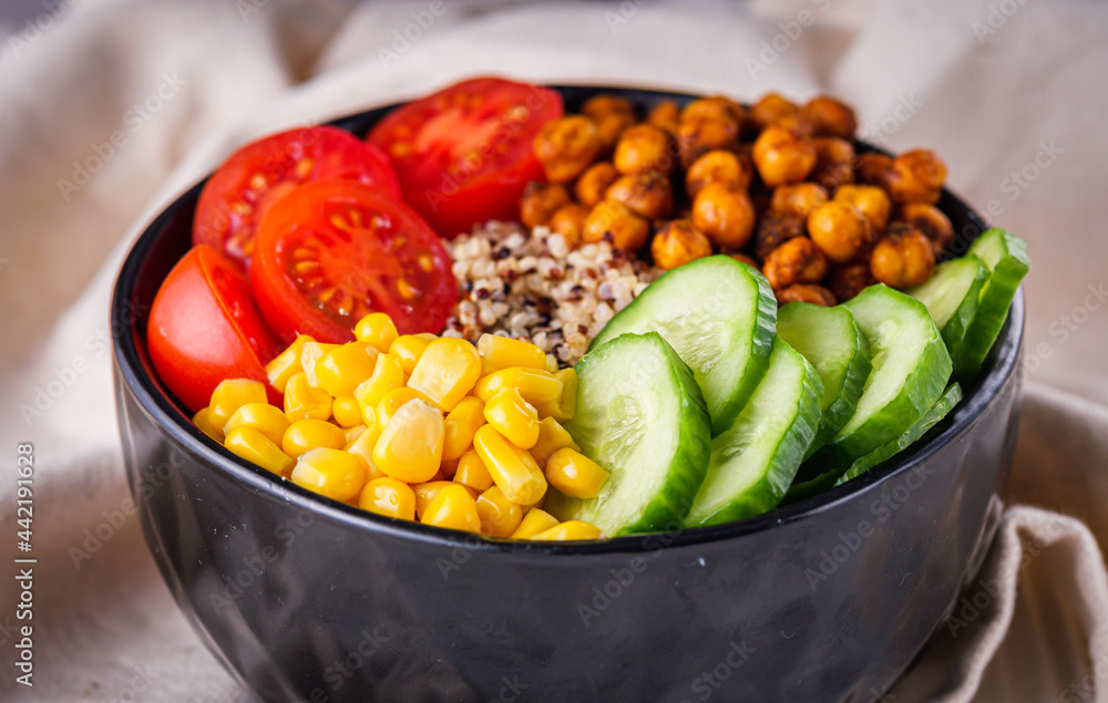 bowl of healthy quinoa with vegetables on a white rustic wooden background bowl of healthy quinoa with vegetables on a white rustic wooden background
