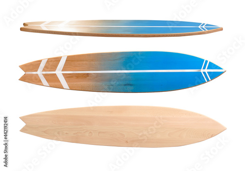 Different view of wooden surfboard on white background photo