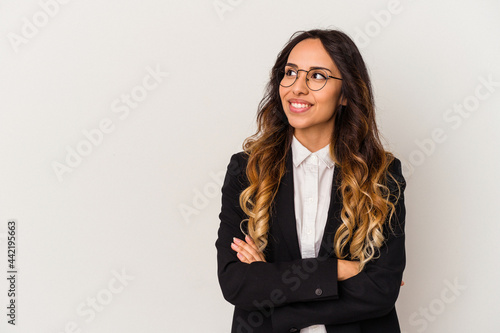 Young mexican business woman isolated on white background smiling confident with crossed arms.