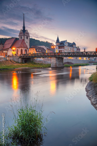 Obraz na płótnie Gera, Germany. Cityscape image of old town Gera, Thuringia, Germany with St. Mary's Church and Untermhaus Bridge over White Elster River at sunset. w salonie