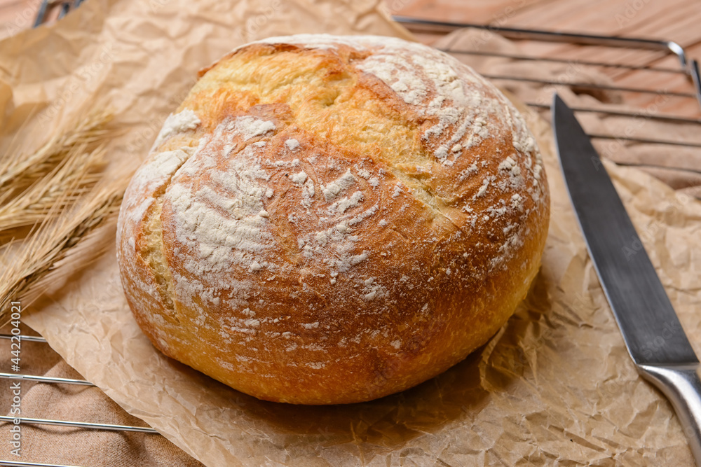 Loaf of sourdough bread on tray