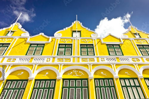 Historic Penha building in the Dutch-Caribbean colonial style, details on the Breedestrat side, Punda district of Willemstad, Curacao, January 2018 photo