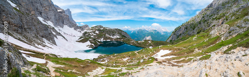 Fototapeta Naklejka Na Ścianę i Meble -  Beautiful mountain landscape, banner. Coldai lake overview. Italian Alps, Dolomites. Glacial lake on top of the mountain. Travel destination. Mountain panorama.