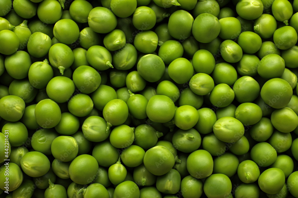 Fresh raw green peas as background, top view Fresh raw green peas as background, top view