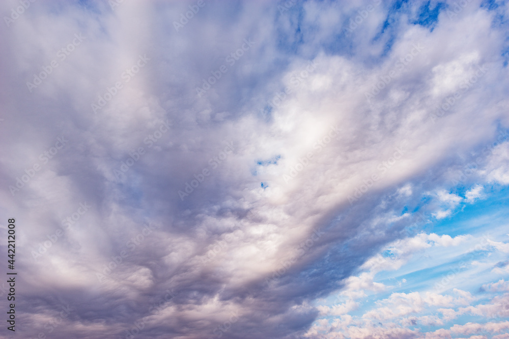Obraz premium Stormy clouds on the blue sky.