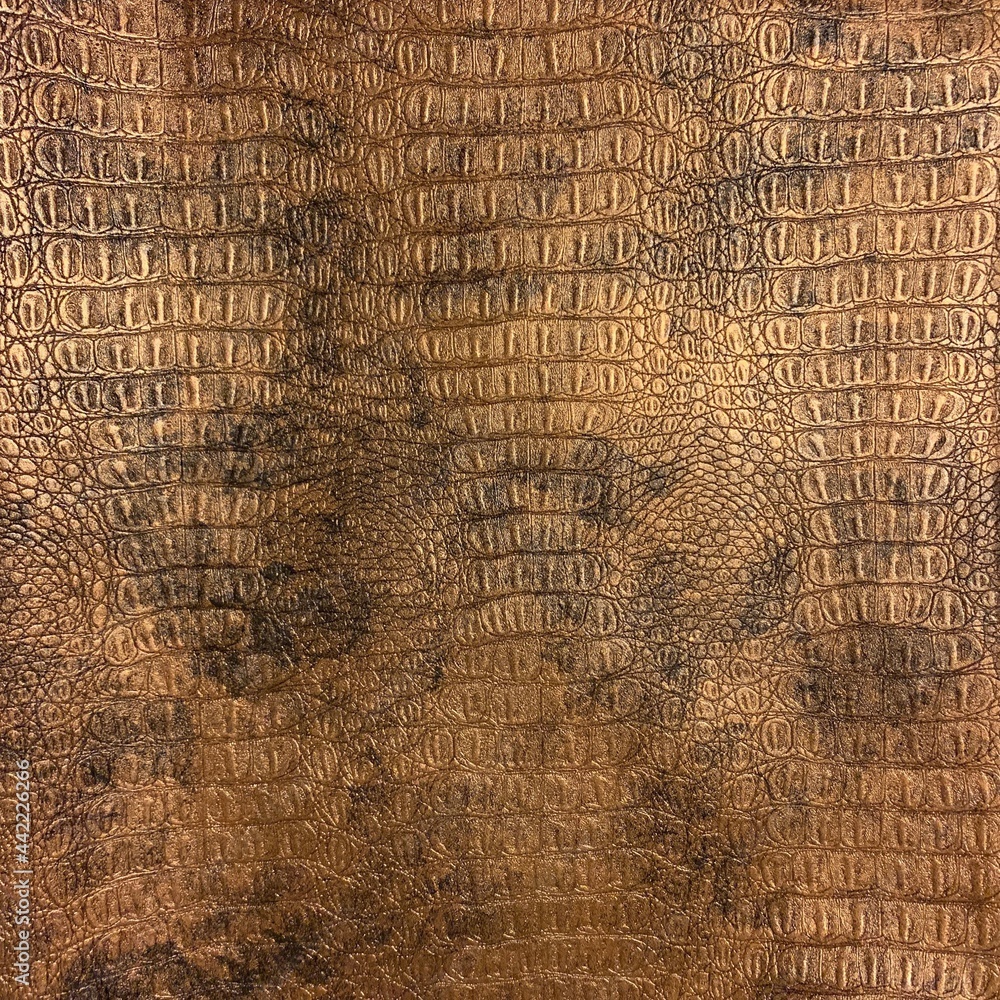 Fototapeta premium Artificial leather texture with croc skin pattern in bronze color