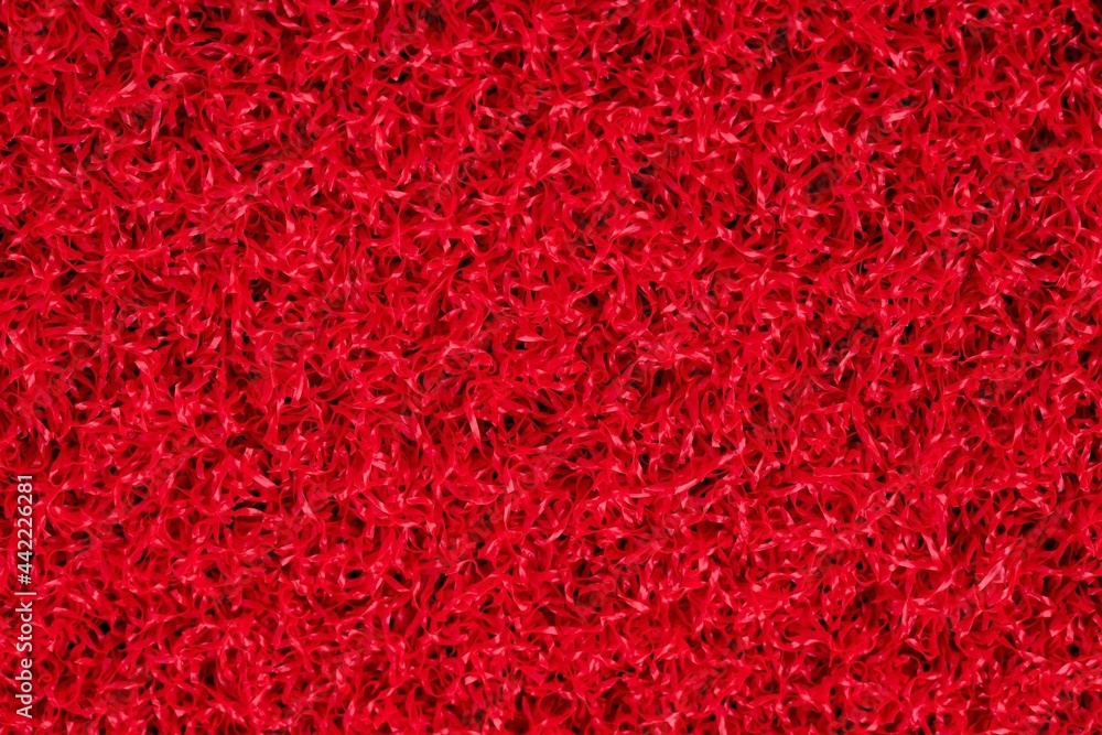 Artificial red grass carpet texture Artificial red grass carpet texture