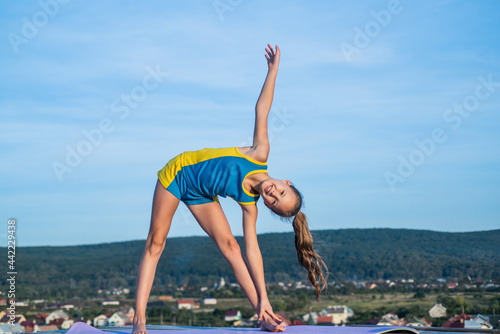 back to school. physical training. athletic child has flexible body. workout of gymnast.