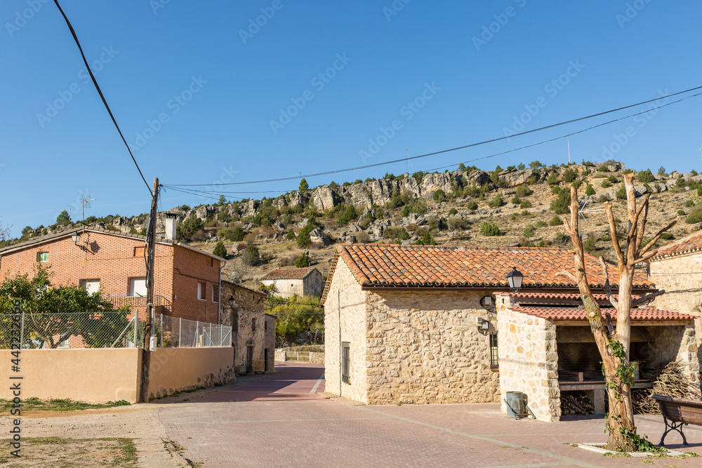 a street in Fuembellida village with traditional houses, province of Guadalajara, Castile-La Mancha, Spain