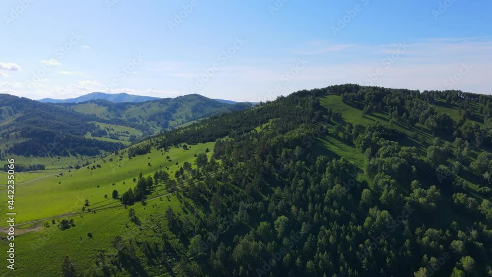 4K Aerial shot of mountains and road. Mountains, peaks, cliffs, rocks, ridges, landscape, green grass, sky, clouds, nature, uncultivated nature, drone. People travel enjoying nature and life concept 4K Aerial shot of mountains and road. Mountains, peaks, cliffs, rocks, ridges, landscape, green grass, sky, clouds, nature, uncultivated nature, drone. People travel enjoying nature and life concept