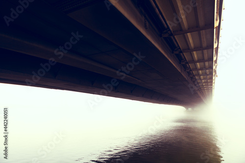 Bridge over the river in mysterious fog . Haze over Danube  © russieseo