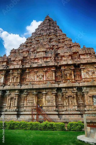 Carved friezes and niches are covered with religious carvings photo