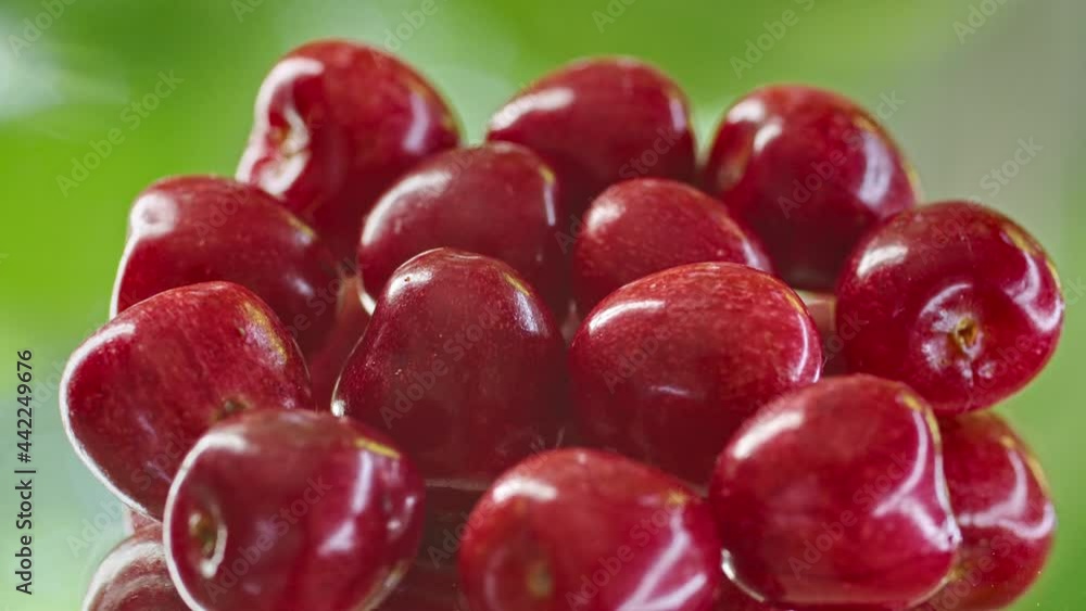 close-up, cherries spinning on a stand. close-up, cherries spinning on a stand.