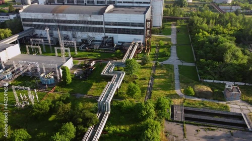 Aerial drone view flight near thermal power plant. Cooling towers of CHP photo