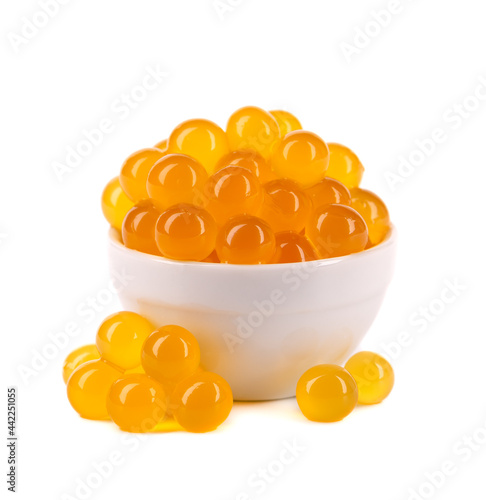 Canvas-taulu Red tapioca pearls for bubble tea isolated on white background
