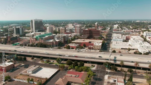 Aerial: Downtown Stockton and freeway traffic, California, USA photo