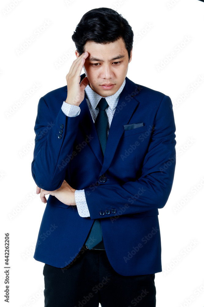 Young attractive asian business man wearing navy blue suit with white shirt and necktie put his hand on his head looking disappointed and stressful. White background isolated Young attractive asian business man wearing navy blue suit with white shirt and necktie put his hand on his head looking disappointed and stressful. White background isolated