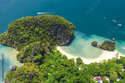 Surrounding Islands of Koh Yao Noi, Thailand islands in the background, three points of the island in a tropical ocean with beaches and copy space for text holiday destination photo